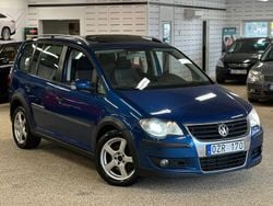 Blå Begagnad 2007 VW Touran Cross Minibuss | 79 990 kr