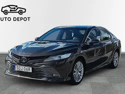 Mörkbrun Begagnad 2019 Toyota Camry Hybrid Executive Sedan | 209 000 kr (Marknadspris)