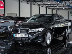Svart Begagnad 2022 BMW 330e Kombi | 324 500 kr (Marknadspris)