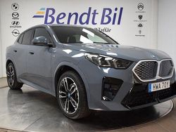 Grå (storm bay metallic) Begagnad 2024 BMW iX2 M Sport SUV | 519 500 kr (Bra pris)