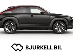 Multitone jet black/maroon rouge Begagnad 2023 Mazda MX30 Edition SUV | 481 400 kr