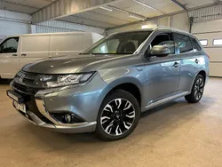 Mörkgrå Begagnad 2015 Mitsubishi Outlander P-HEV Comfort Edition SUV | 114 500 kr (Lite dyr)