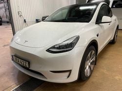 Vit (vit metallic) Begagnad 2024 Tesla Model Y Long Range AWD SUV | 465 000 kr (Marknadspris)