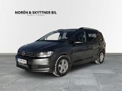 Mörkgrå Begagnad 2016 VW Touran Minibuss | 209 000 kr (Marknadspris)