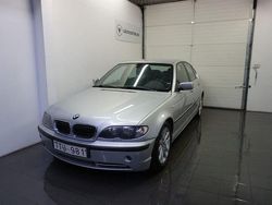 Grå Begagnad 2003 BMW 320 Sedan | 39 900 kr (Marknadspris)