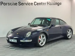 Mörkblå Begagnad 1996 Porsche 911 Carrera 4S | 1 595 000 kr
