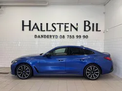 Blå (portimao blau metallic) Begagnad 2022 BMW i4 M Sport Sedan | 479 000 kr (Bra pris)