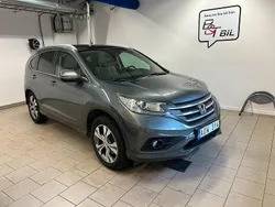 Ljusgrå (grå metallic) Begagnad 2013 Honda CR-V Executive SUV | 119 900 kr (Marknadspris)
