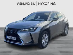 Ljusgrå (grå) Begagnad 2021 Lexus UX 250h E-FOUR SUV | 299 000 kr (Marknadspris)