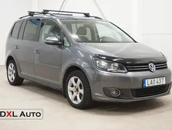 Mörkgrå (grå) Begagnad 2011 VW Touran Minibuss | 59 900 kr (Marknadspris)