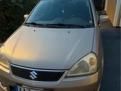 Brun Begagnad 2005 Suzuki Liana Halvkombi | 13 500 kr (Marknadspris)