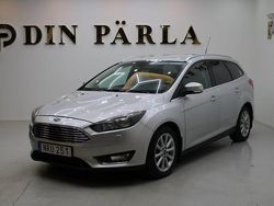 Grå Begagnad 2015 Ford Focus Titanium Kombi | 64 900 kr (Marknadspris)