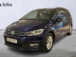Mörkblå Begagnad 2015 VW Touran Minibuss | 189 900 kr (Marknadspris)
