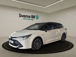 Vit Begagnad 2020 Toyota Corolla Hybrid Executive Kombi | 269 900 kr (Marknadspris)
