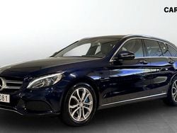 Mörkblå (blue) Begagnad 2017 Mercedes C350e Kombi | 199 900 kr