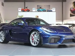 Mörkblå Begagnad 2021 Porsche 718 Cayman GT4 Sportkupé | 1 169 000 kr (Marknadspris)