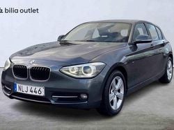 Grå Begagnad 2015 BMW 118 Halvkombi | 114 900 kr (Marknadspris)