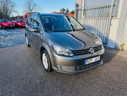 Mörkgrå Begagnad 2012 VW Touran Minibuss | 109 900 kr (Lite dyr)