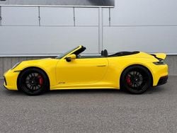 Flerfärgad (gul) Begagnad 2023 Porsche 911 Carrera GTS Cab | 1 750 000 kr (Marknadspris)
