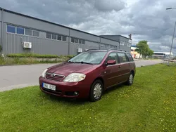 Mörkröd Begagnad 2005 Toyota Corolla Kombi | 49 900 kr (Marknadspris)