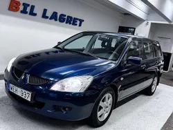 Mörkblå Begagnad 2004 Mitsubishi Lancer Kombi | 29 900 kr (Marknadspris)
