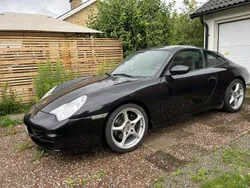 Svart Begagnad 2003 Porsche 911 Carrera Sportkupé | 350 000 kr