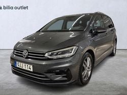 Mörkgrå Begagnad 2018 VW Touran R-line Minibuss | 259 900 kr (Marknadspris)