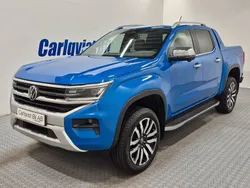 Blå metallic Begagnad 2024 VW Amarok Aventura Pickup | 745 000 kr (Marknadspris)