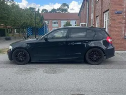 Svart Begagnad 2006 BMW 130 Comfort Edition Halvkombi | 125 000 kr