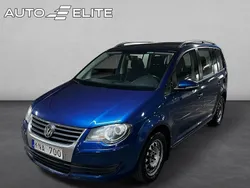 Mörkblå Begagnad 2009 VW Touran Trendline Minibuss | 58 800 kr