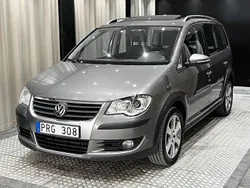 Mörkgrå Begagnad 2009 VW Touran Cross Minibuss | 119 900 kr (Dyr)