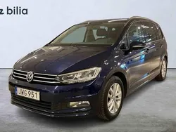 Blå Begagnad 2016 VW Touran Minibuss | 189 900 kr