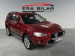 Mörkröd (röd) Begagnad 2011 Mitsubishi Outlander Comfort Edition SUV | 84 500 kr (Marknadspris)
