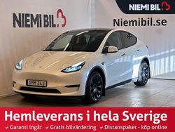 Vit Begagnad 2023 Tesla Model Y Long Range AWD SUV | 439 900 kr (Marknadspris)