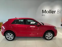 Röd (tangoröd metallic) Begagnad 2018 Audi Q2 Sport SUV | 189 000 kr (Marknadspris)