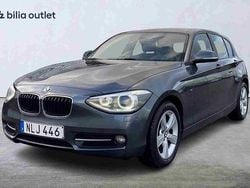 Grå Begagnad 2015 BMW 118 Halvkombi | 109 900 kr (Marknadspris)