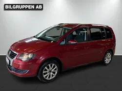 Mörkröd (röd) Begagnad 2010 VW Touran Trendline Minibuss | 37 900 kr (Bra pris)