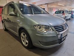 Mörkgrå Begagnad 2009 VW Touran Trendline Minibuss | 46 900 kr (Dyr)