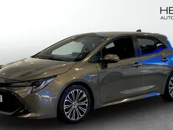 Grön (brown) Begagnad 2019 Toyota Corolla Hybrid Style Halvkombi | 209 900 kr (Marknadspris)