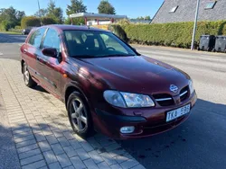 Mörkröd Begagnad 2002 Nissan Almera Halvkombi | 19 900 kr