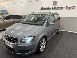 Mörkgrå Begagnad 2008 VW Touran Trendline Minibuss | 39 900 kr (Marknadspris)