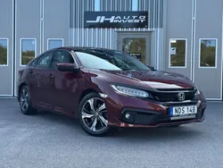 Mörkröd (röd) Begagnad 2019 Honda Civic Executive Sedan | 209 900 kr (Marknadspris)