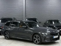 Grå (dravit grey (individual)) Begagnad 2023 BMW 330e M Sport Kombi | 419 900 kr