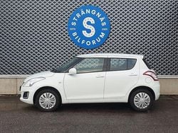 Vit Begagnad 2015 Suzuki Swift Comfort+ Halvkombi | 89 000 kr (Marknadspris)