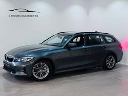 Grå Begagnad 2021 BMW 330e Sport Line Kombi | 229 900 kr (Marknadspris)