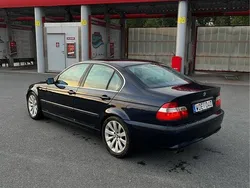 Blå Begagnad 2005 BMW 320 Sedan | 29 000 kr (Marknadspris)