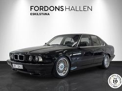 Ljusgrå Begagnad 1993 BMW 540 Sedan | 149 900 kr