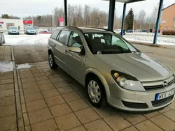 Grå (gul) Begagnad 2004 Opel Astra Kombi | 28 900 kr (Marknadspris)
