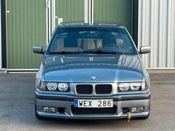 Grå Begagnad 1996 BMW 323 Sedan | 100 000 kr