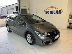 Mörkgrå (grå) Begagnad 2015 Honda Civic Elegance Kombi | 109 900 kr (Marknadspris)